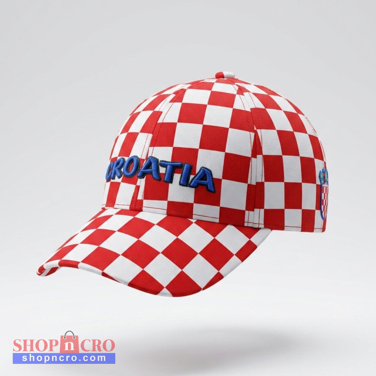 Red and white checkered cap with 'KROATIA' text on a light gray background
