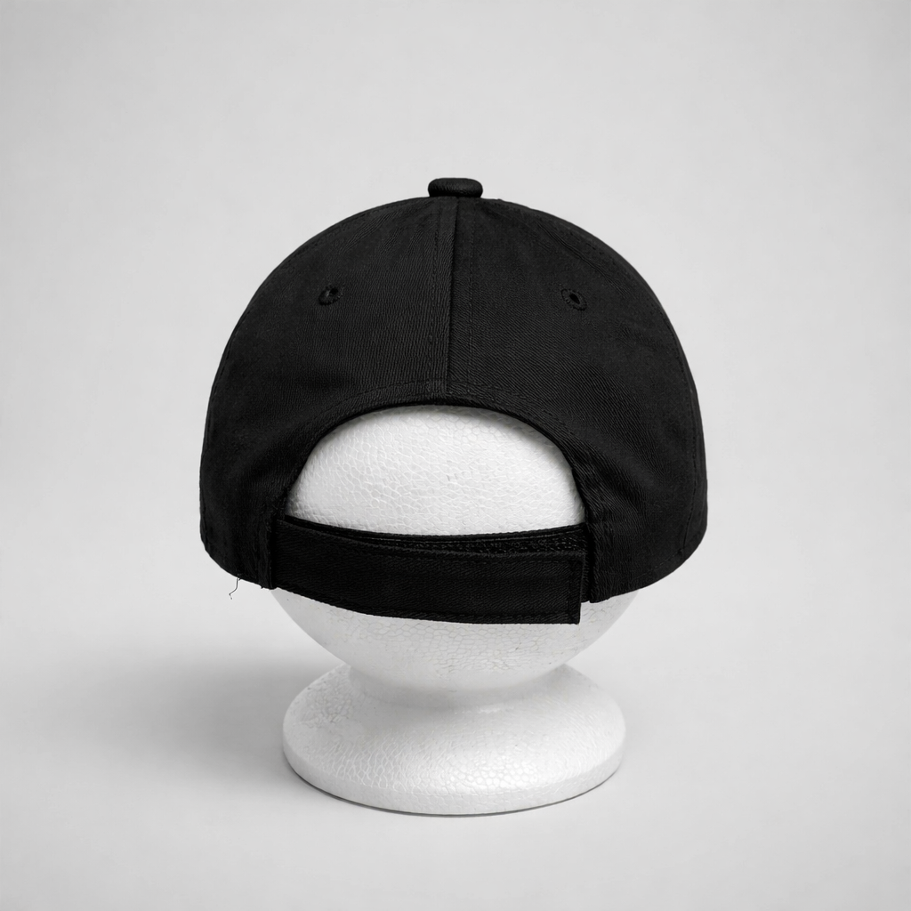 Baseball Cap Prvo Bijelo Polje Black cap on a white mannequin head against a light gray background on shopncro.com