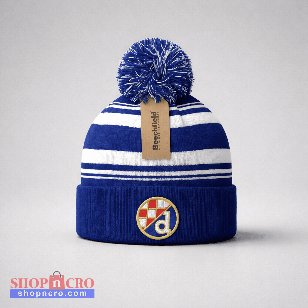 Beanie Dinamo Zagreb Pom Pom in Blue Blue and white striped beanie with pom-pom and brand tag on a light gray background