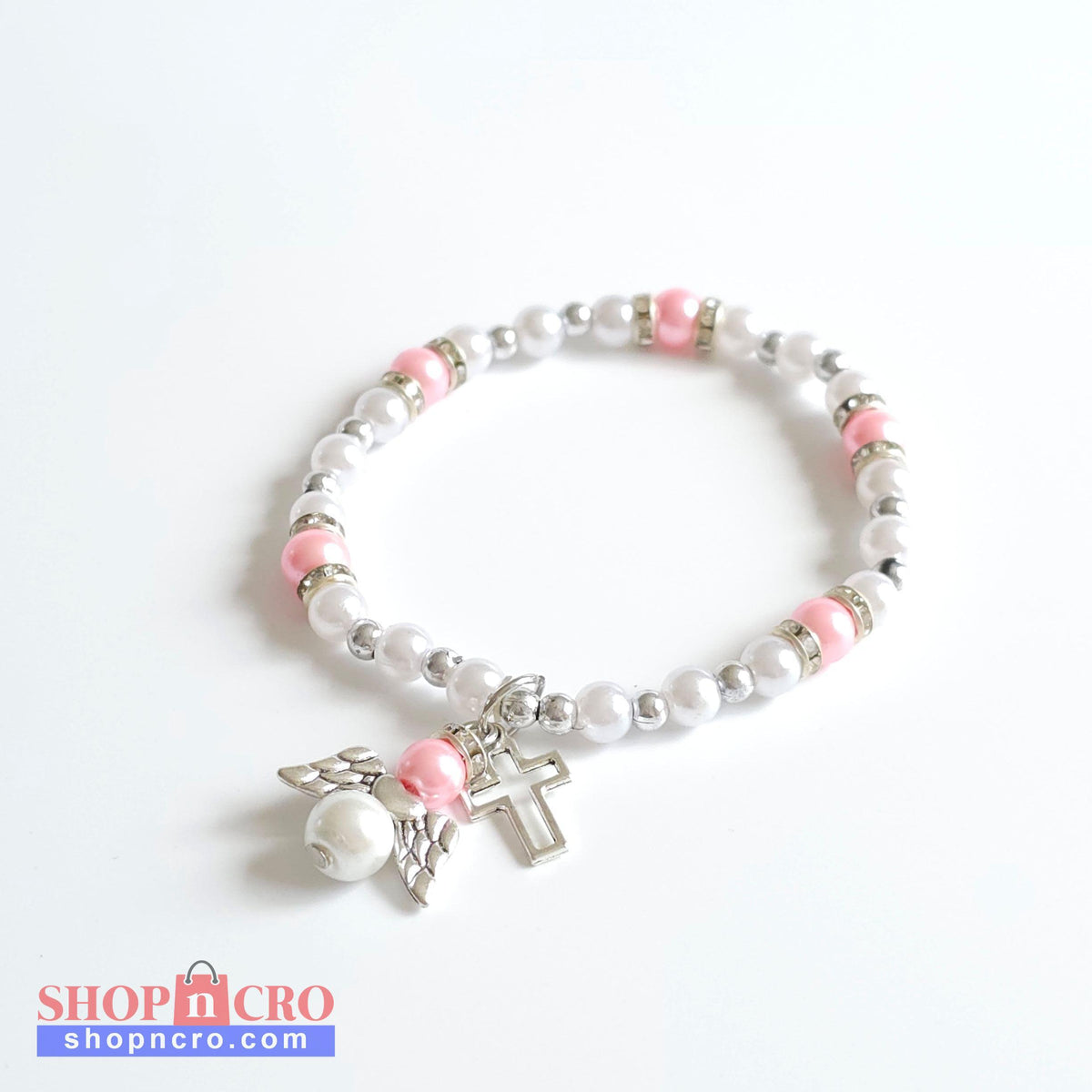 Bracelet Pink & White Angel Cross Bracelet with white beads, pink accents, and a silver cross charm on a white background