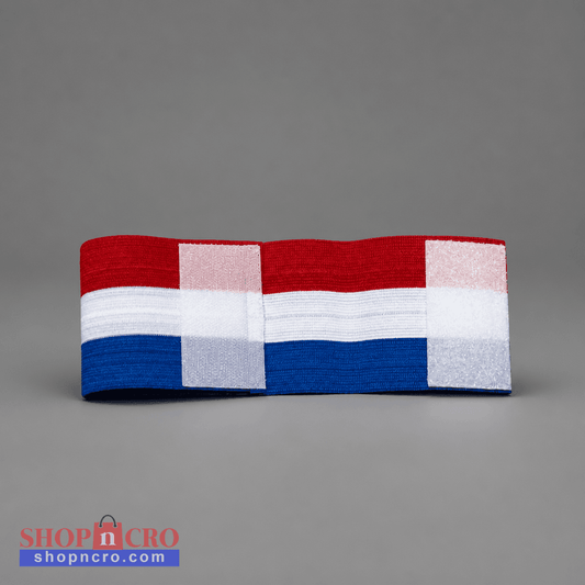A fabric headband featuring a Dutch flag pattern with red, white, and blue horizontal stripes, photographed on a neutral gray background. Croatia Captain Armband