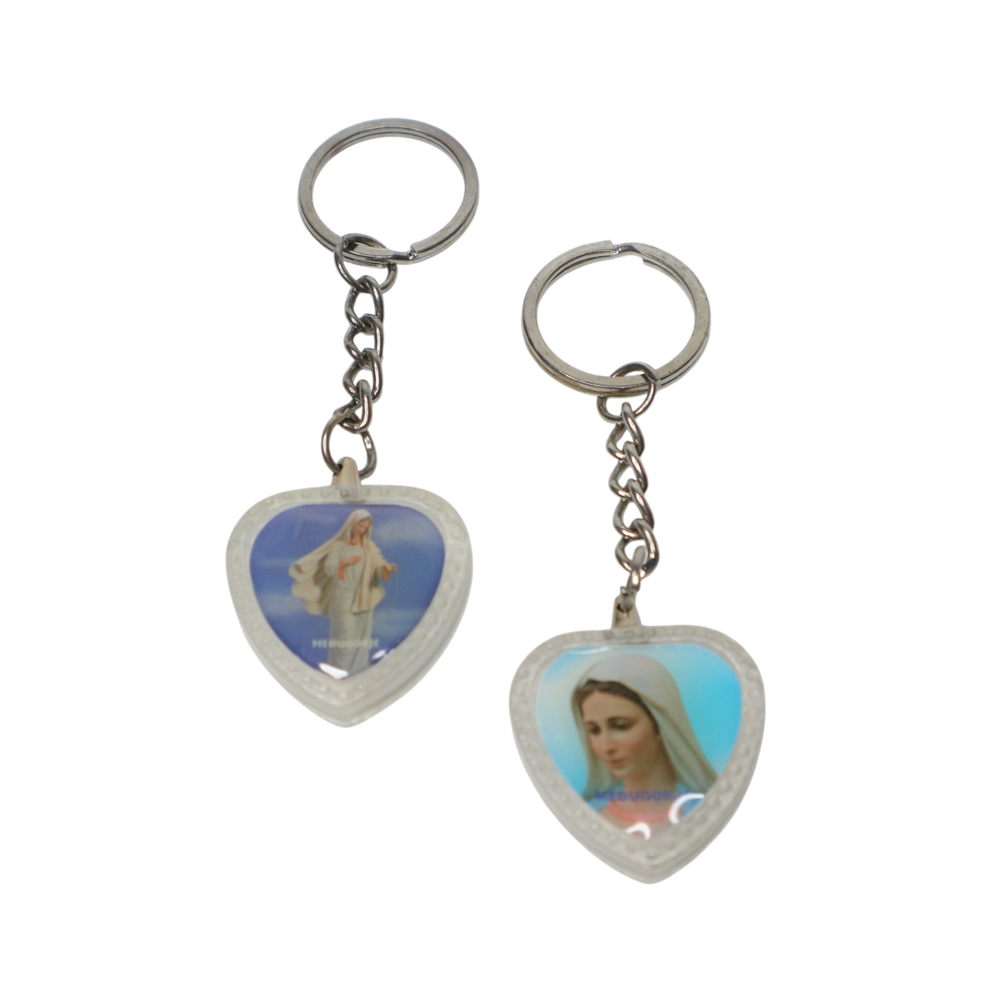 Heart-Shaped Catholic Keyring - Virgin Mary of Medjugorje Two heart-shaped keychains with images of a woman on a white background