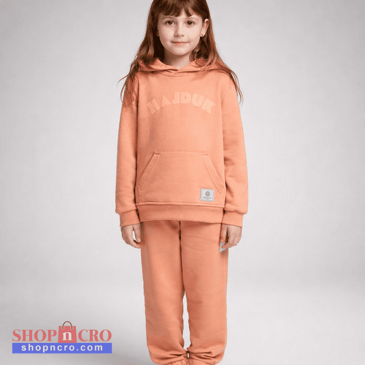 Child wearing a peach-colored hoodie and pants with 'MAJOR' branding on a gray background Kids Tracksuit Hajduk