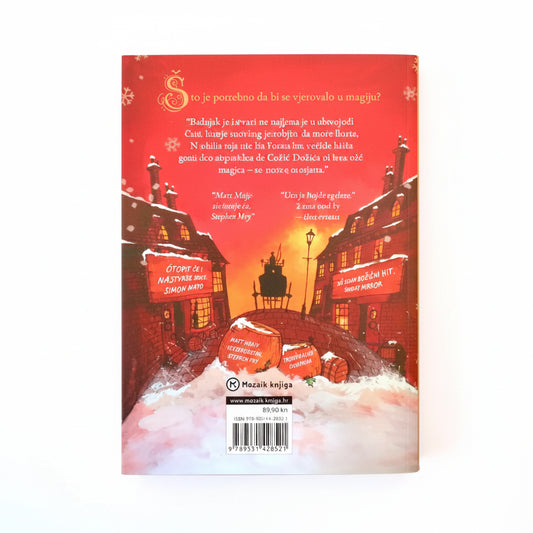 Matt Haig – Djevojčica Koja je Spasila Božić (The Girl Who Saved Christmas) Book cover with a snowy village scene and red text on a white background