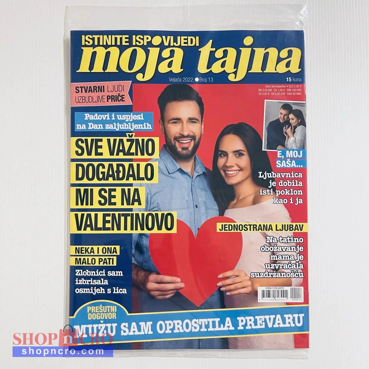 Moja Tajna Magazine Croatian Magazine cover with a couple holding a heart and text in Croatian