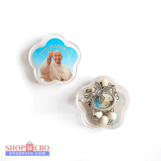 Pope Francis White Catholic Rosary with Vatican Souvenir Case Two decorative items with Pope Francis on one and a religious symbol on the other, on a white background.