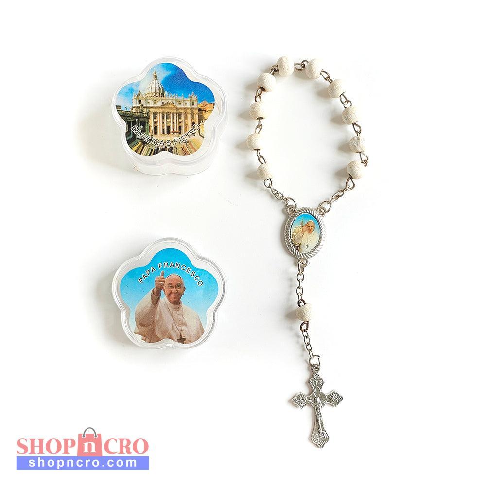 Pope Francis White Catholic Rosary with Vatican Souvenir Case Rosary with images of a building and a religious figure on a white background