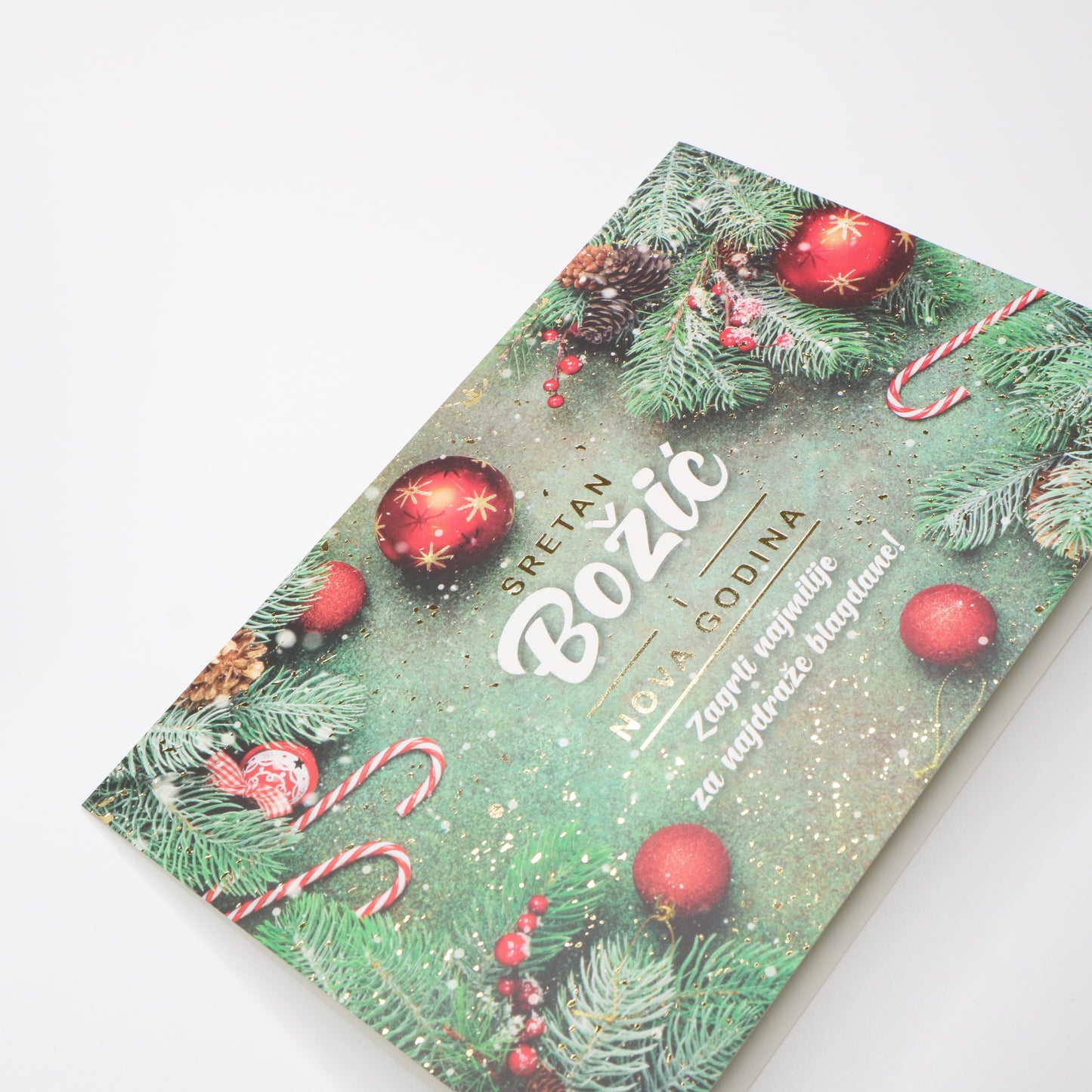 Sretan Božić Baubles Christmas Greeting Card Holiday-themed notebook with Christmas decorations on a white background