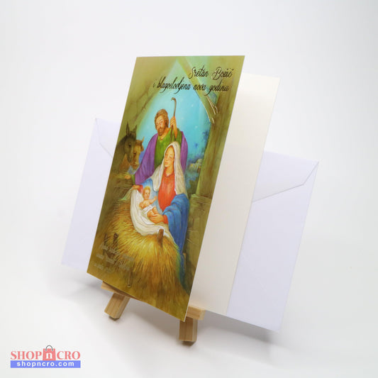 Sretan Božić Manger Christmas Greeting Card Greeting card with religious illustration on a stand with an envelope behind