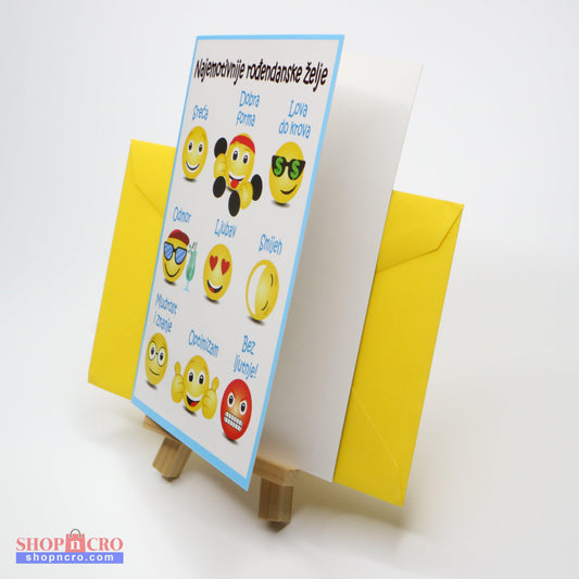 Sretan Rođendan Emoji Birthday Card Greeting card with smiley face designs on a stand with a yellow envelope.