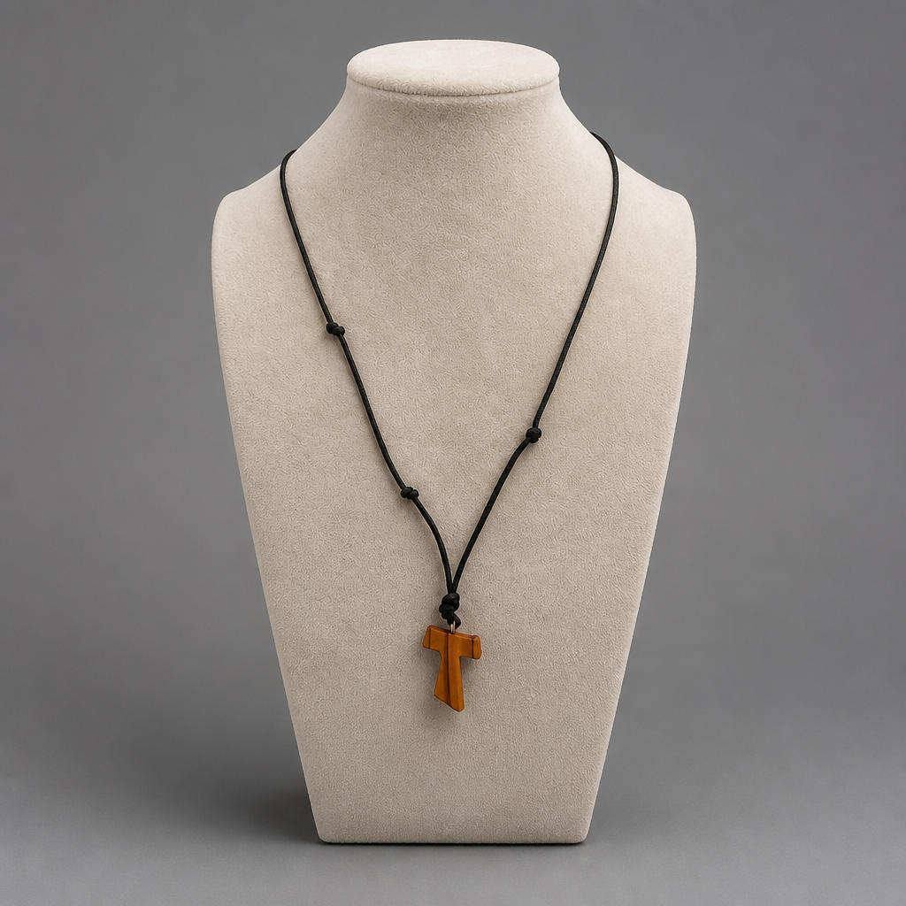 Traditional Međugorje Necklace (S) Necklace with a wooden cross pendant on a mannequin bust against a gray background shopncro