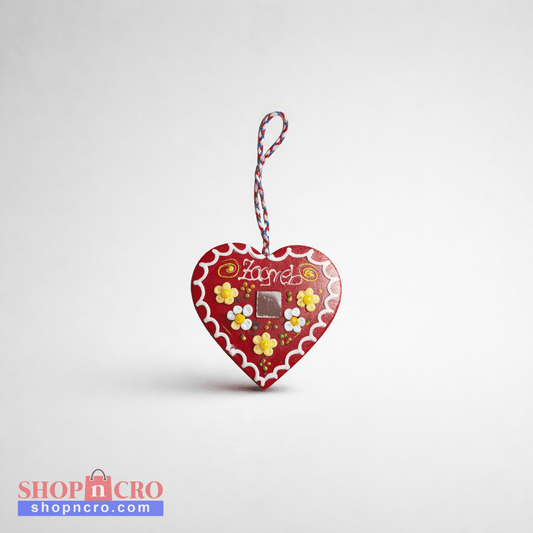 Croatian Traditional Souvenir Licitar (Licitarsko Srce) Heart-shaped chocolate packaging with flowers and 'Lindt' branding on a light gray background