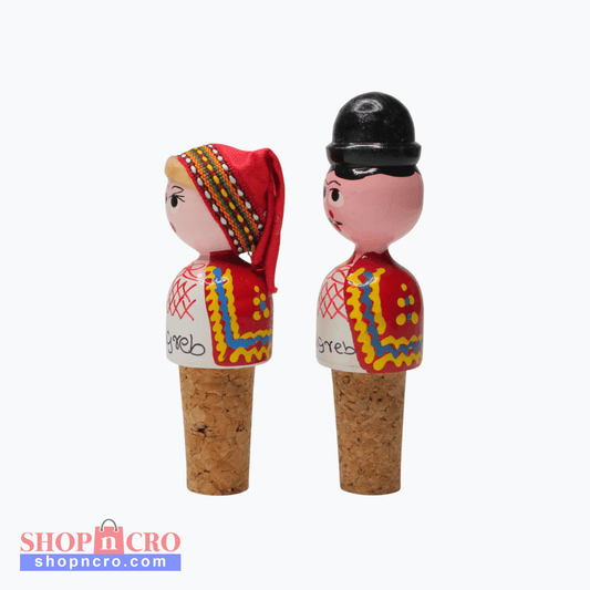 Wine Cork Boy & Girl Set Two cork stoppers with decorative figures on a white background