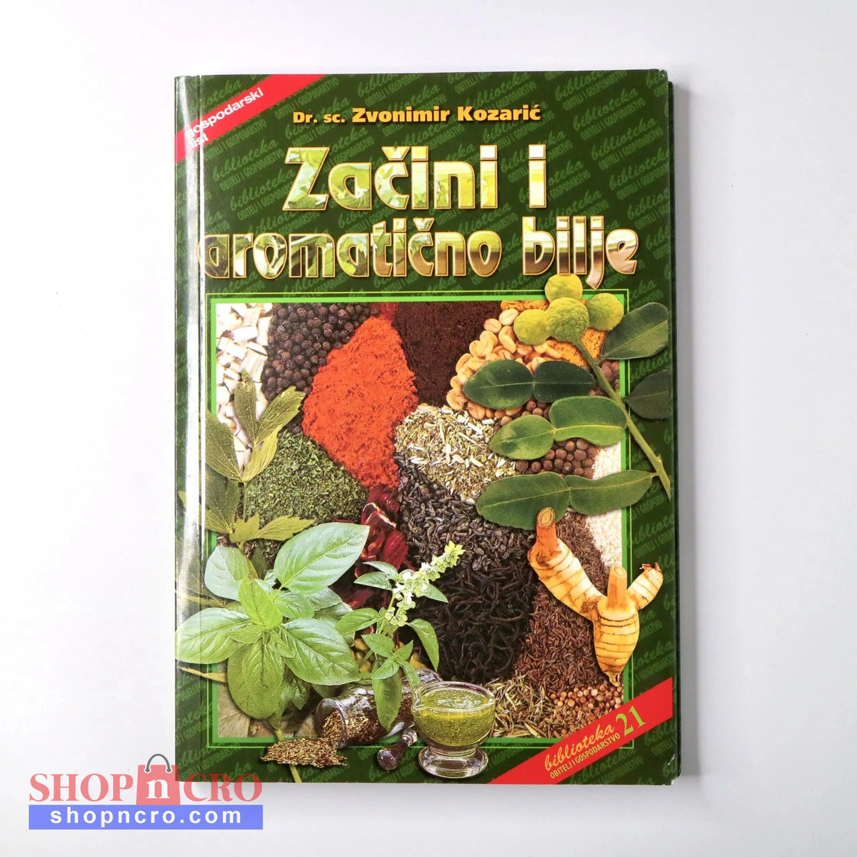 Začini i Aromatično Bilje Book cover of 'Zažini i aromatićno bilje' with images of herbs and spices on a white background