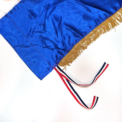 Croatian Historic Silk Flag Prvo Bijelo Polje 200cm by 100cm Blue graduation gown with gold trim and a red, white, and blue tassel on a white background
