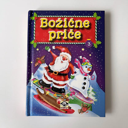 Božićne Priče Book cover with Santa Claus and snowman on a snowy background, featuring the text 'Boōzièe príce'.
