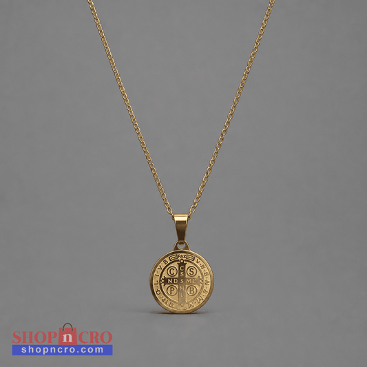 Croatian Medallion Necklace – St. Benedict Pendant (gold chain) A gold pendant necklace featuring a circular Saint Benedict medal pendant on a delicate gold chain, set against a solid gray background.