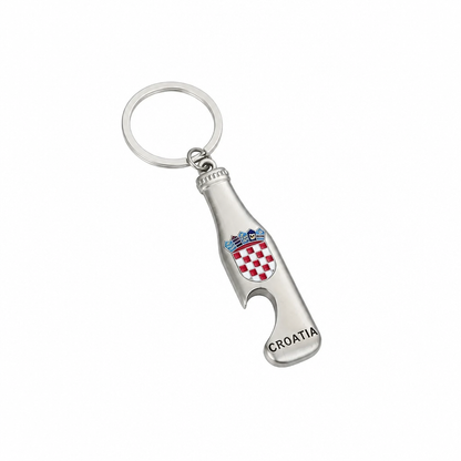 Keyring Croatia with Bottle Opener A silver metal keychain shaped like a bottle opener with a Croatian shield emblem and the word 'CROATIA' printed on it, set against a plain white background.