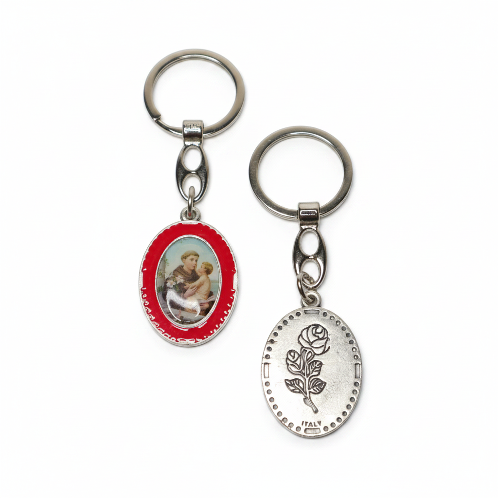 Keyring Saint Anthony of Padua – Double-Sided Religious Medal (Red Enamel) Two keychains with religious-themed designs on a white background