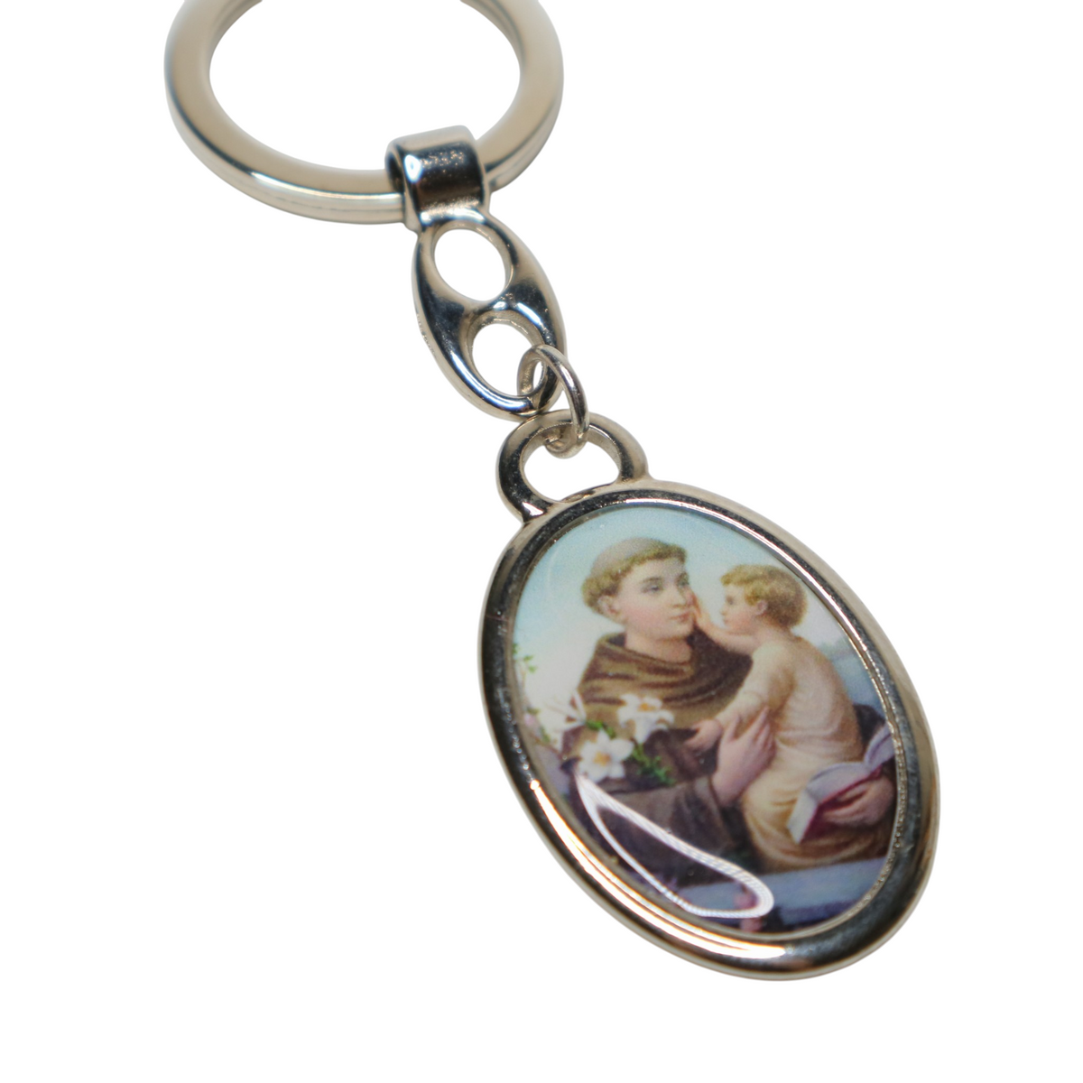 Keyring Saint Anthony of Padua – Silver-Tone Religious Medal (oval) Keychain with an oval pendant featuring a religious design on a white background