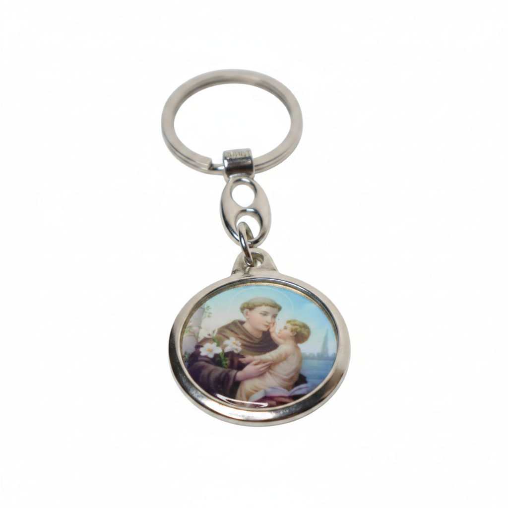 Keyring Saint Anthony of Padua – Silver-Tone Religious Medal (round) Keychain with a circular design featuring an image of a person holding a child on a white background