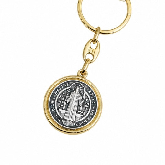 Međugorje Keyring Saint Benedict Medal in Gold A gold-tone and silver-tone round Saint Benedict medal keychain on a plain white background.