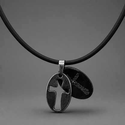 Oče Naš Necklace – Sliding Pendant Necklace with a black cord and silver pendant on a gray background