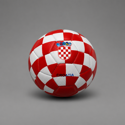 A red and white checkered soccer ball with the Croatian coat of arms and the word 'CROATIA' printed on it, photographed on a neutral gray background. Soccer Ball Croatia Checks (half size) shopncro